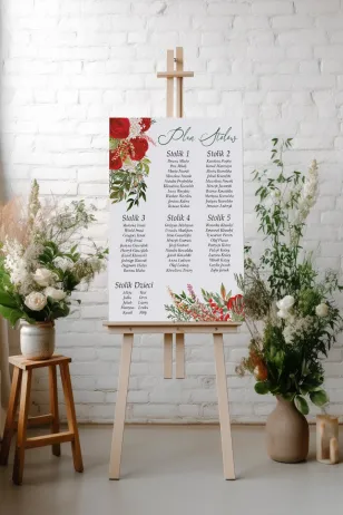 Zimowy Ślubny Plan stołów z czerwoną różą i zielonymi gałązkami z dodatkiem bieli