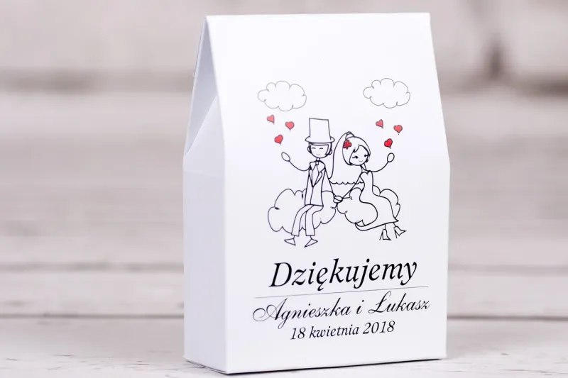 Ślubne pudełeczko na słodkości Bueno nr 3 - Rysunek zakochanej Pary Młodej dryfującej w chmurach