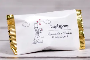 Pralinen - Hochzeitsgeschenke aus der Kollektion Bueno No. 4 - Tanzendes junges Paar in einer Cartoon-Version im informellen