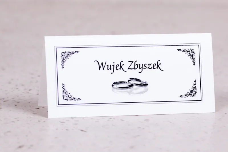 Winietki, wizytówki na stół z kolekcji Arte nr 1 - Elegancki wzór z delikatną ramką i motywem obrączek Winietki, wizytówki na stół z kolekcji Arte nr 1 - Elegancki wzór z delikatną ramką i motywem obrączek