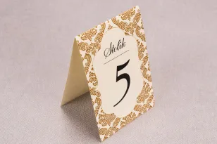 Ślubne numery stolików weselnych z kolekcji Madras nr 7 - ciepło brązowe ornamenty