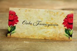 Ludowe Winietki, wizytówki na stół weselny, z folklorystyczną kwiatową grafiką.