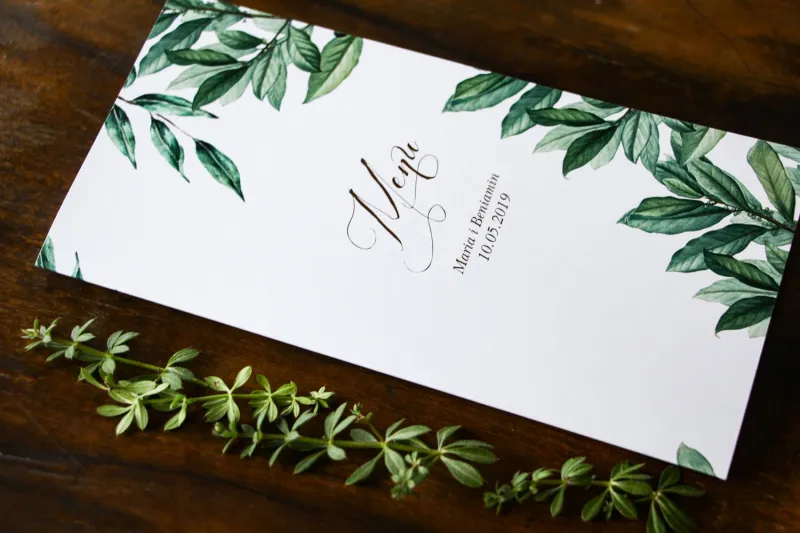 Menu ślubne na stół weselny z motywem gałązek oliwki, projekt utrzymany w stylistyce greenery