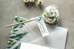 Lutscher - süß danke an die Hochzeitsgäste. Weiß-grünes Schild mit vergoldeter Inschrift und Maiglöckchen