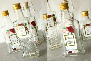 Tinkturflaschen mit glamourösem Etikett mit vergoldetem Rahmen und Text sowie Burgunder- und Burgunderpfingstrosen
