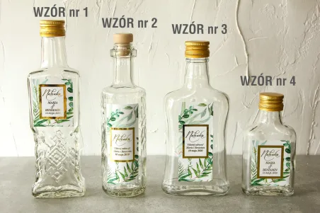 Butelki na nalewki wraz z etykietą w stylu glamour ze złoconą ramką i tekstem z botanicznym motywem greenery