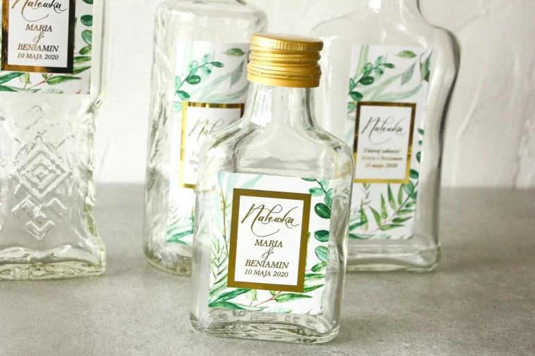Butelki na nalewki z botaniczną etykietą glamour i złoconą ramką | Upominki dla gości weselnych glamour