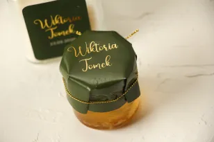 Glas Honig - Hochzeit dank der Gäste. Grüne Reithaube mit Vergoldung, die mit einer goldenen Schnur gebunden ist