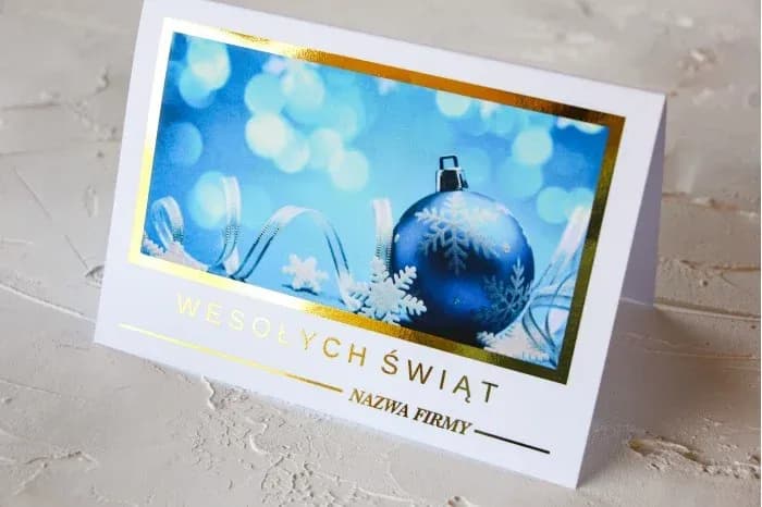 Carte de Noël premium avec dorure et logo Élégante carte de vœux d'entreprise avec boule bleue et inscription dorée