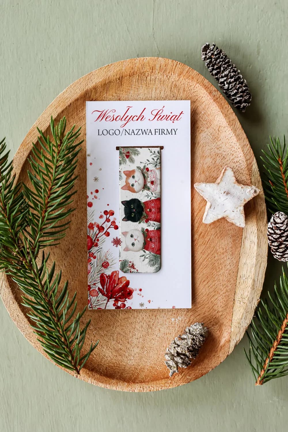 Personalized magnetic bookmark as a corporate Christmas gift, featuring cats in a winter setting.