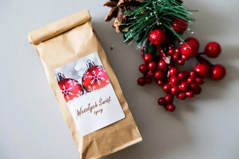 Corporate Christmas tea in an eco-friendly bag with a red bauble label and company logo