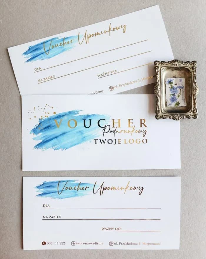 Gift voucher with blue watercolor brush strokes and gold foiling, model VC3.