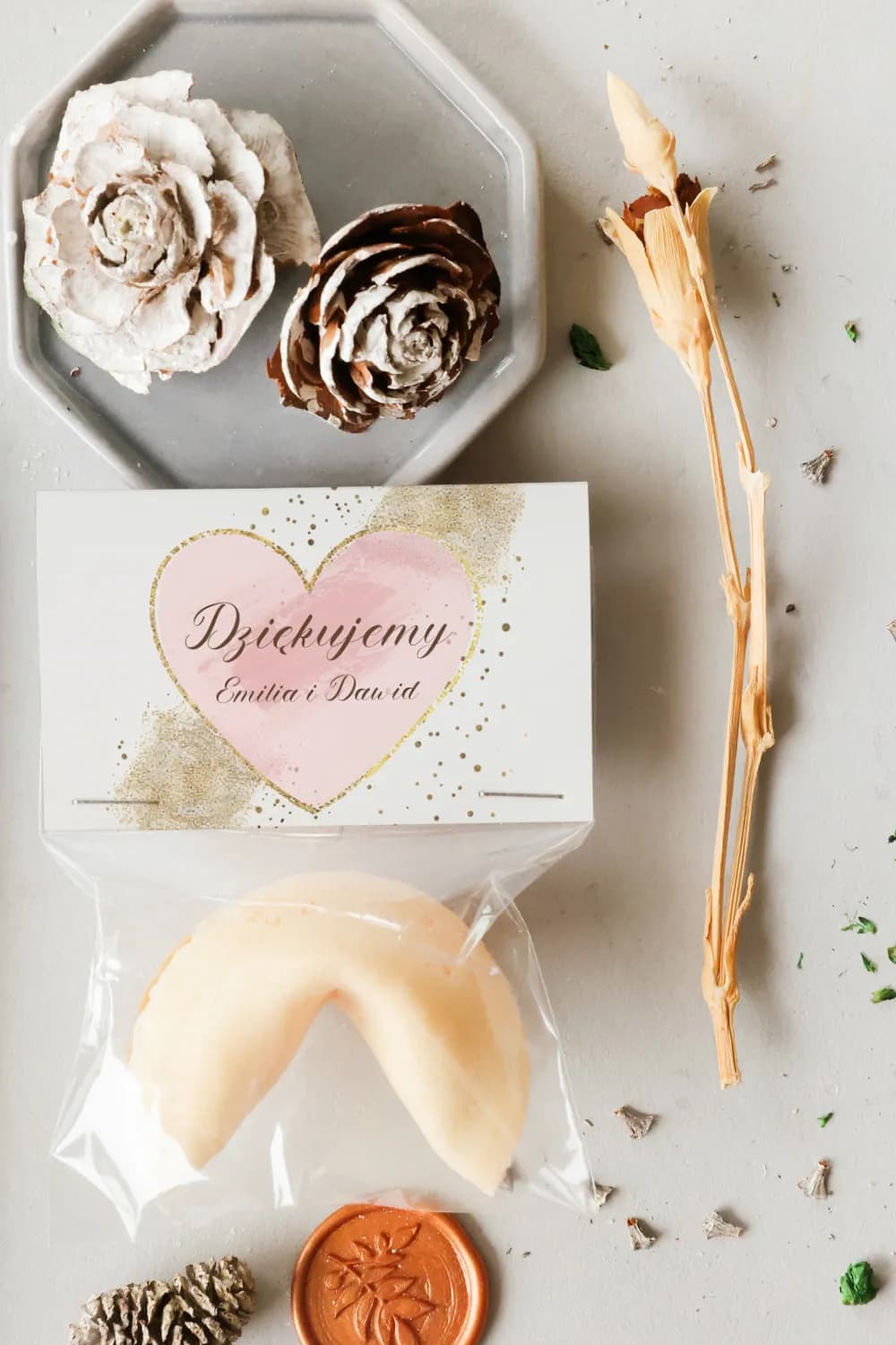 Original fortune cookie in pastel pink with gold accents