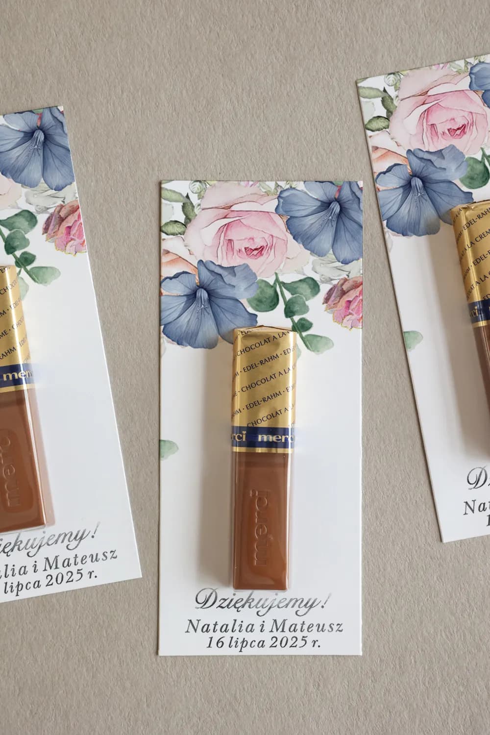 Wedding favour with Merci chocolate, pastel pink and blue flowers with gold text, Rubin No. 14